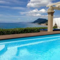 Complex of 5 small seafront villas in Corfu for sale 1