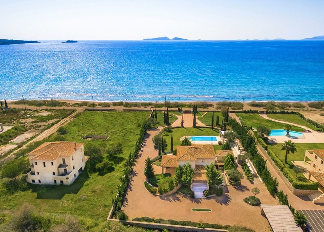 NEW Seafront Villa in Peloponnese, Beachfront Property in Porto Heli. Buy this luxury Villa at the most cosmopolitan spot in Greece. Porto Heli Real Estate